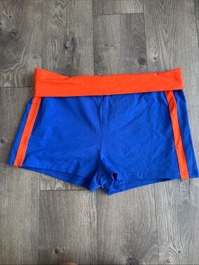Women's Blue Athletic Shorts with Orange Waistband and Side Stripes